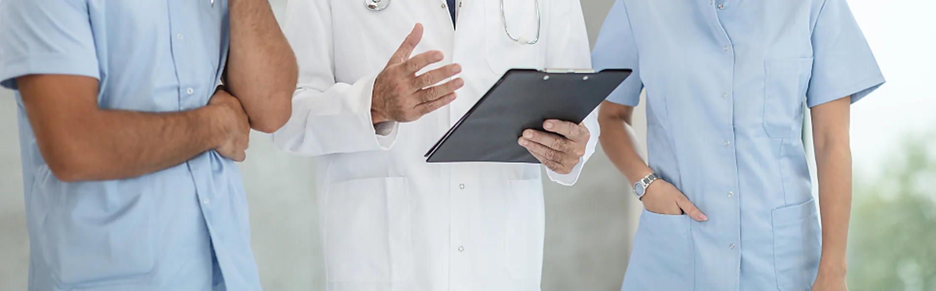 Clinicians reviewing a patient chart together