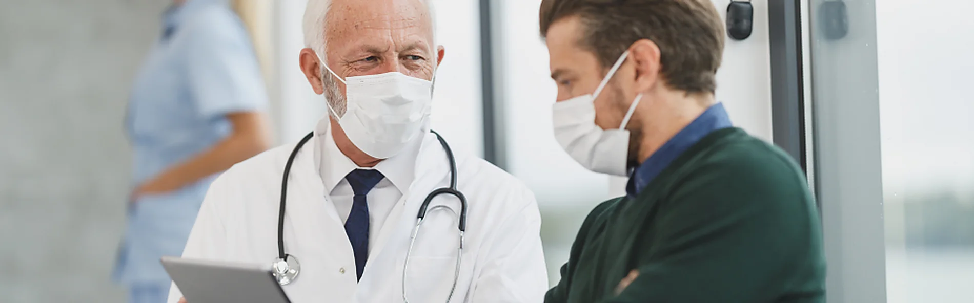 A clinician discussing a care plan with a patient